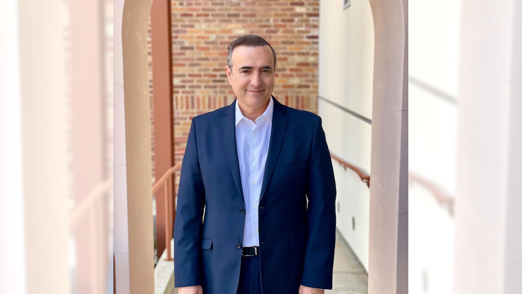 man wearing suit standing